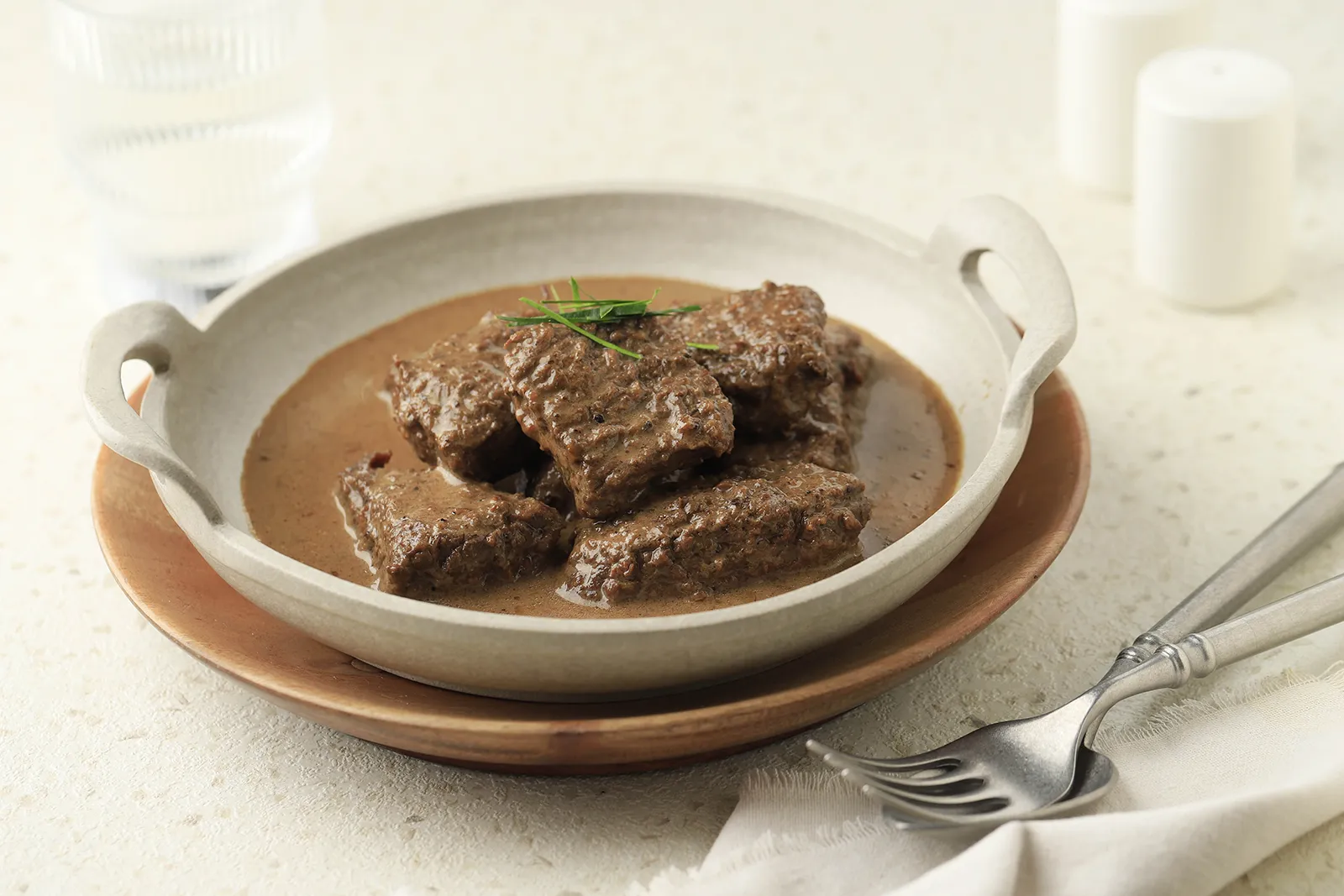 a beef stew on a white table