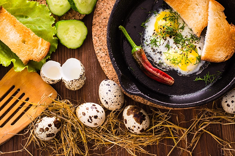 seasoned eggs in a pan on a table
